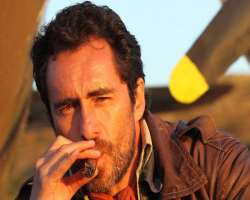 Demian Bichir smoking